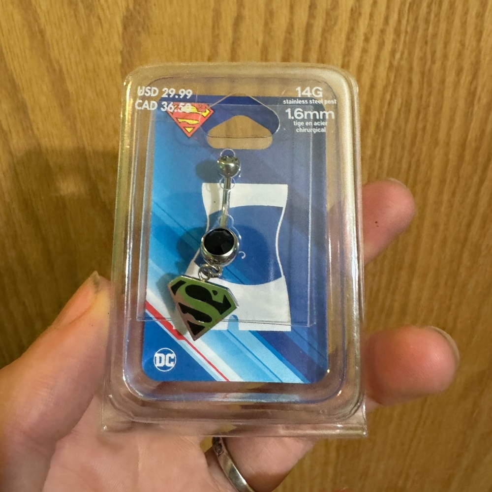 Superman belly ring